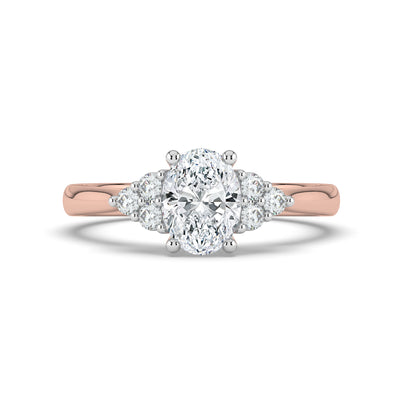 Oval and Cluster Diamond Ring