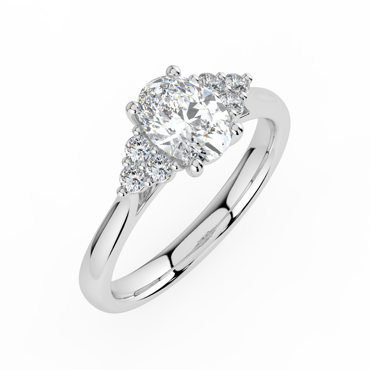 Oval and Cluster Diamond Ring
