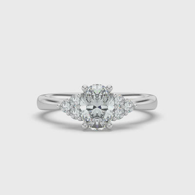 Oval and Cluster Diamond Ring