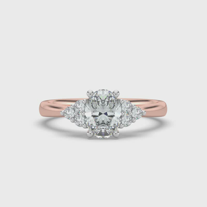 Oval and Cluster Diamond Ring