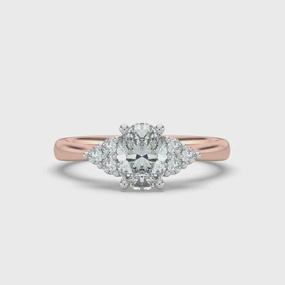 Oval and Cluster Diamond Ring