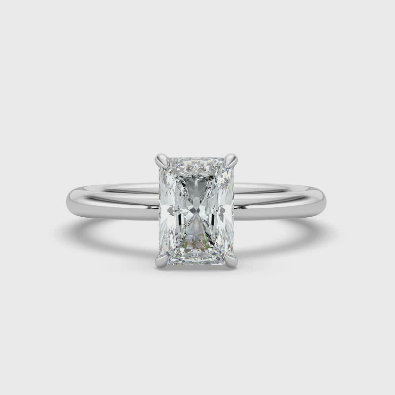Emerald Solitaire Diamond Ring