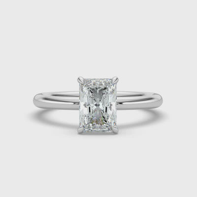Emerald Solitaire Diamond Ring