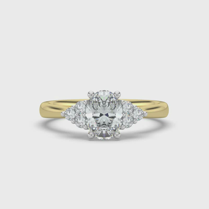 Oval and Cluster Diamond Ring