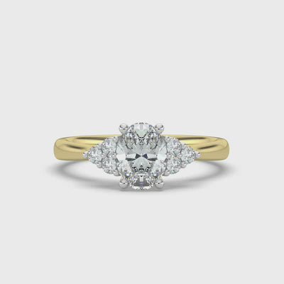 Oval and Cluster Diamond Ring