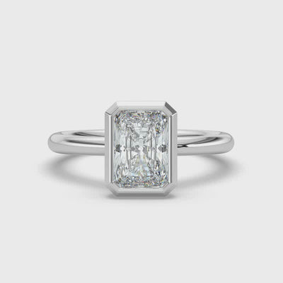 Emerald Bezel Set Solitaire Ring