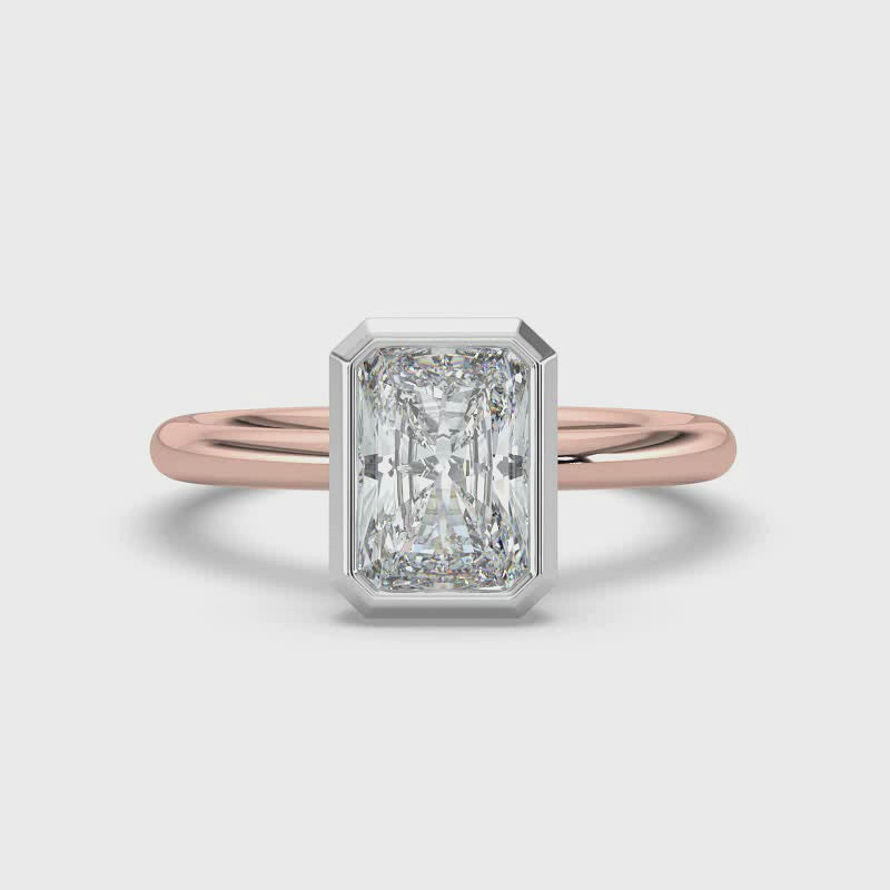 Emerald Bezel Set Solitaire Ring